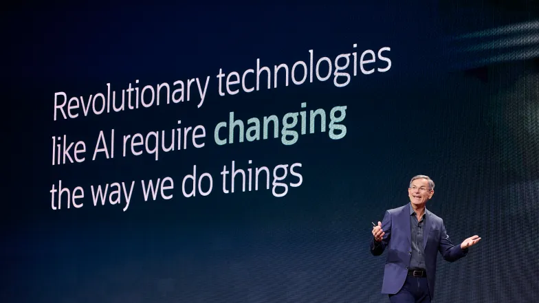 an image of the speaker on the stage